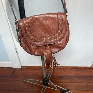 Brown leather fossil crossbody purse with tassel